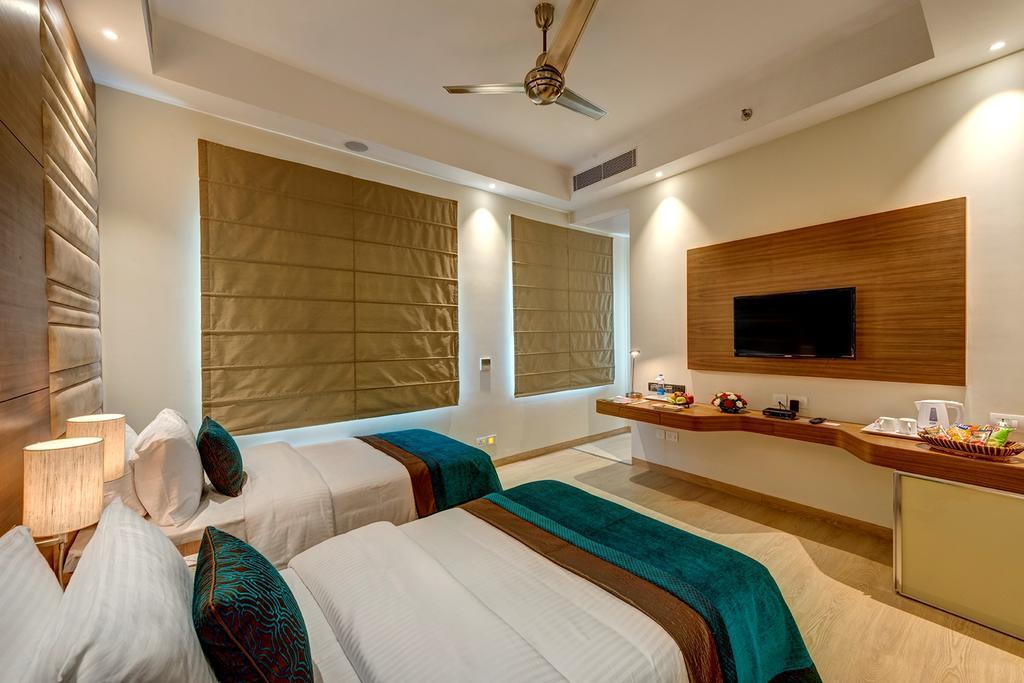 The Astor Hotel Kolkata Phòng bức ảnh